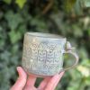 Ceramic mug with bird